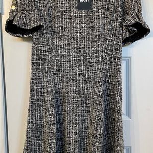 Stylish DKNY dress with front hidden pockets- so comfy  easy to wear!